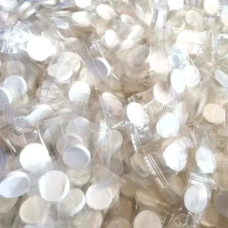 100 Uds Mini toalla comprimida cápsulas desechables toalla mágica cuidado de la cara tableta viajes al aire libre toallitas de tela máscara de tejido de papel