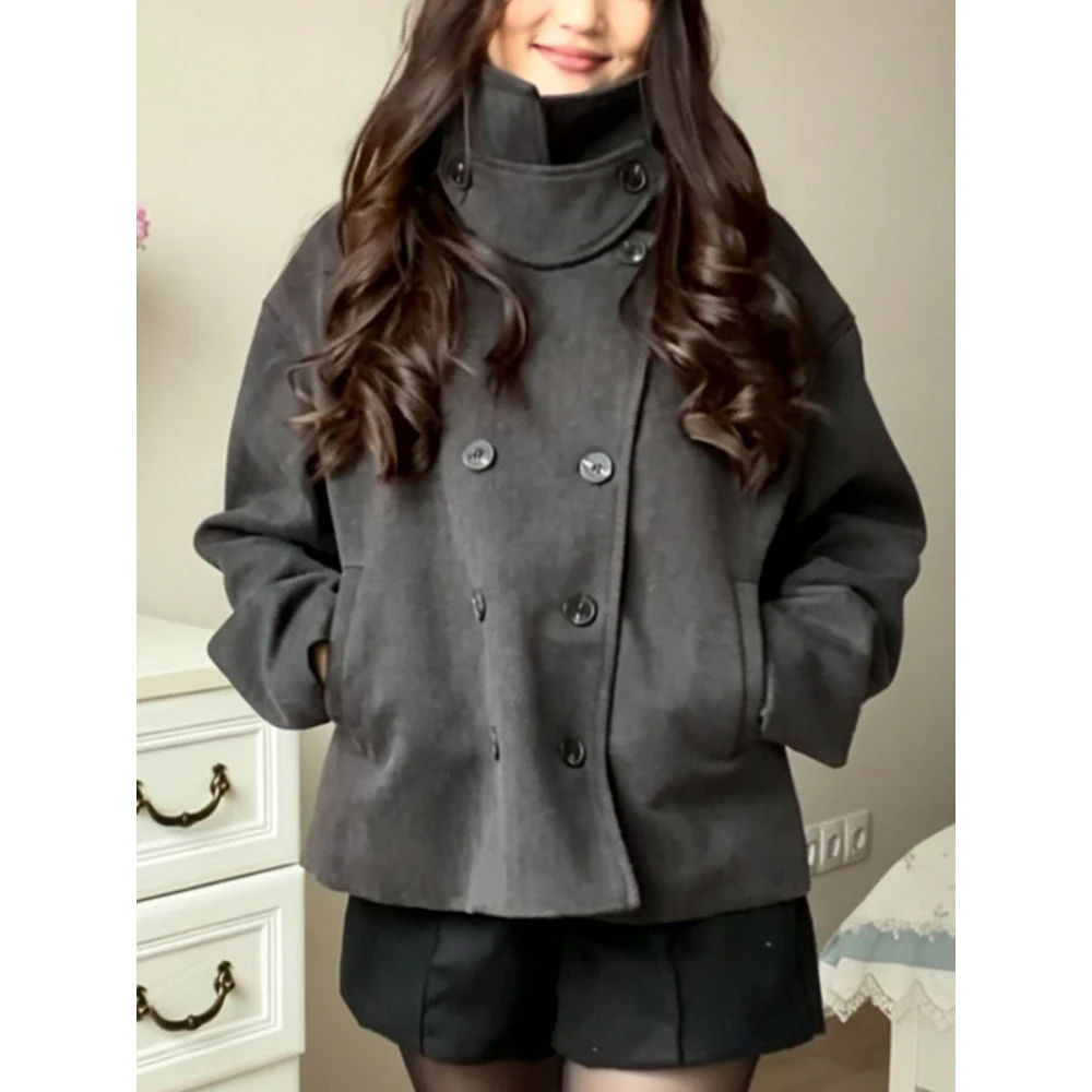 Autumn and winter retro new woolen coat stand collar double-breasted short woolen coat loose long-sleeved warm coat.