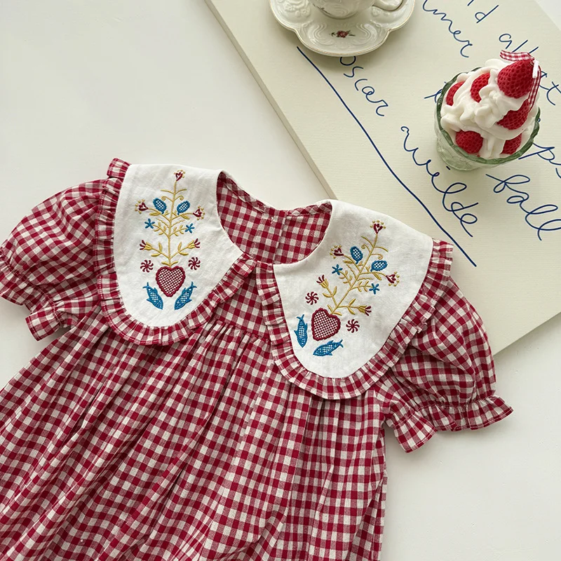 French Children Clothing Peter Pan Collar Flower Embroidery Girls Dress 2026 Summer Red Plaid Short Sleeved Sweet Children Skirt