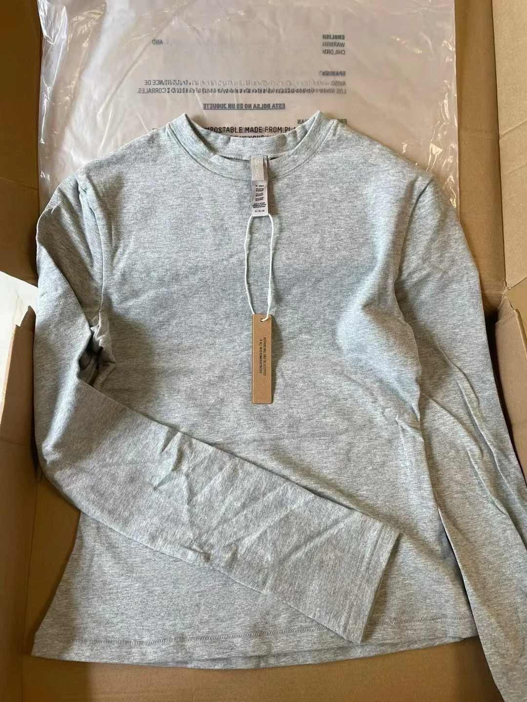 เสื้อยืดคอกลมผ้าฝ้ายคาร์เดียนแท้ทรงเข้ารูป แขนยาว สไตล์ลำลองอเนกประสงค์ เหมาะสำหรับฤดูใบไม้ผลิ แฟชั่นสำหรับผู้หญิง