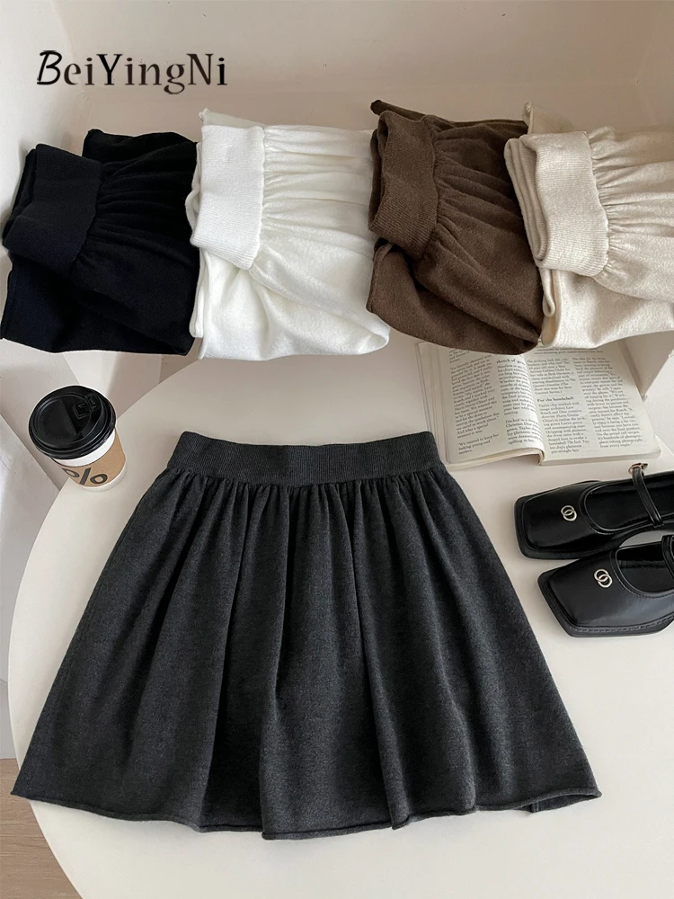 Beiyingni Donna Gonne a trapezio lavorate a maglia Tinta unita Moda coreana Elastico in vita Tutu Minigonna Francese Elegante Pianura Chic Gonne