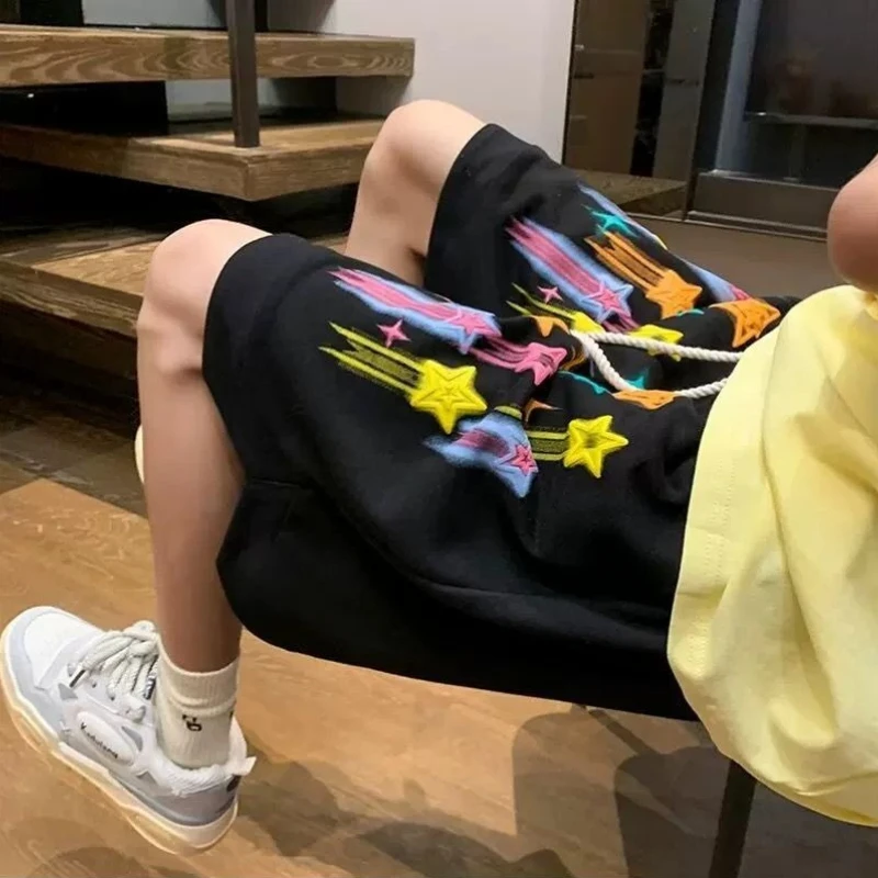 

Trendy Mid-Length Men's Shorts Set with Graffiti Stars Pattern Loose High Street Style for Summer Casual and Sporty Outfits