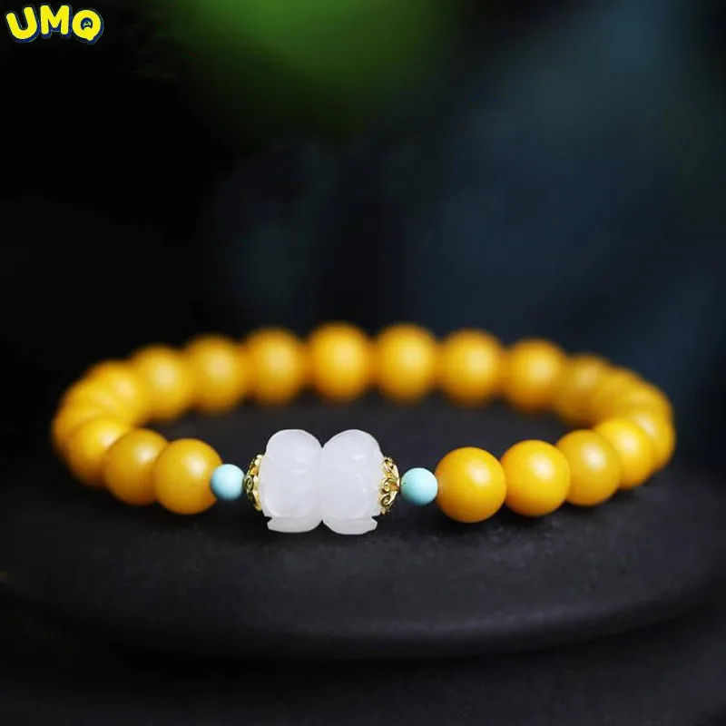 

Taobao Hot Old Honey Chicken Oil Yellow Honey Wax 8mm Hand String Girl Hotan Jade with Lotus Flower Diy Bracelet Literature