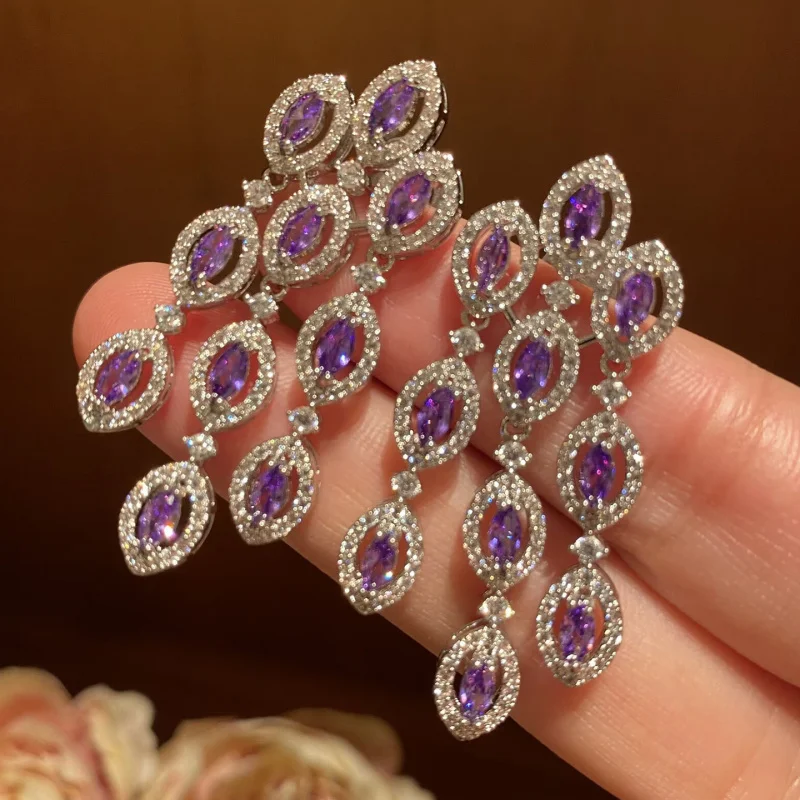 

Изысканные овальные серьги-подвески с фиолетовыми кубическими циркониями, инкрустированные в ореол, с бахромой, для женщин, свадебные украшения