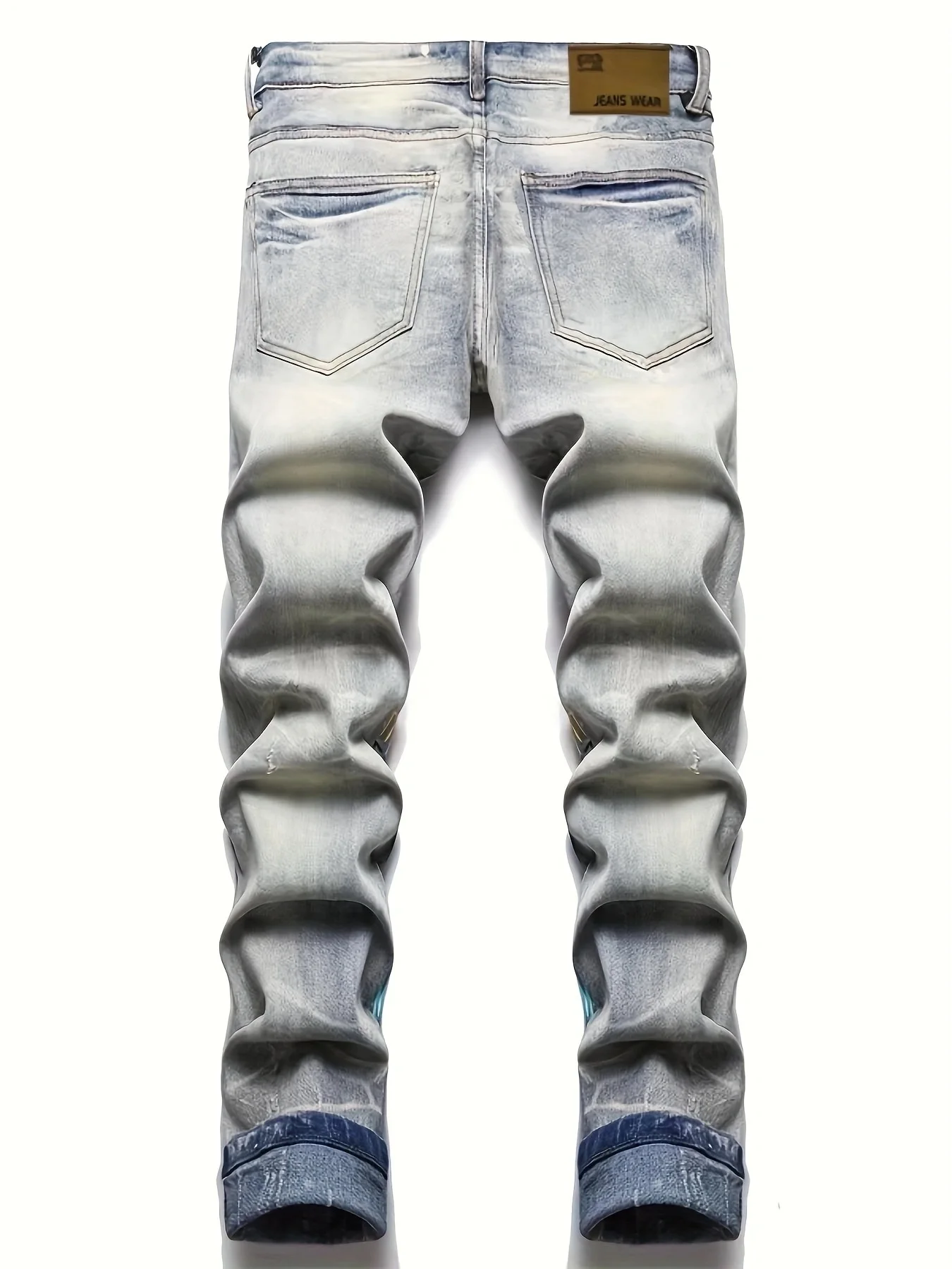 Vecchi jeans lavati e strappati con graffiti stampati europei e americani