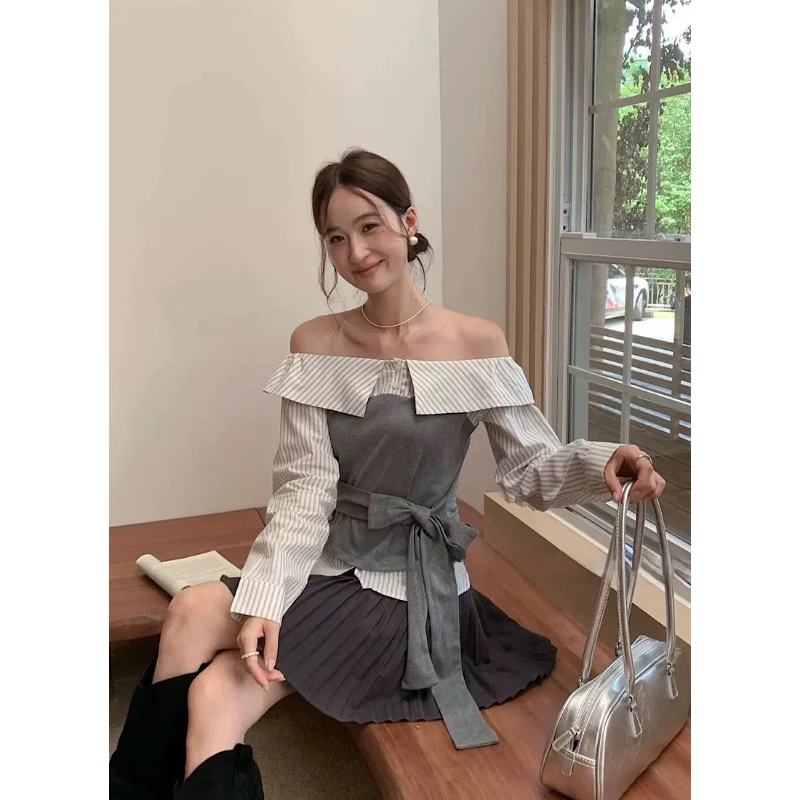 

High-end One-shoulder Fake Two-piece Spliced striped Shirt for Women in Autumn Temperament Straps Slim Long-sleeved Top