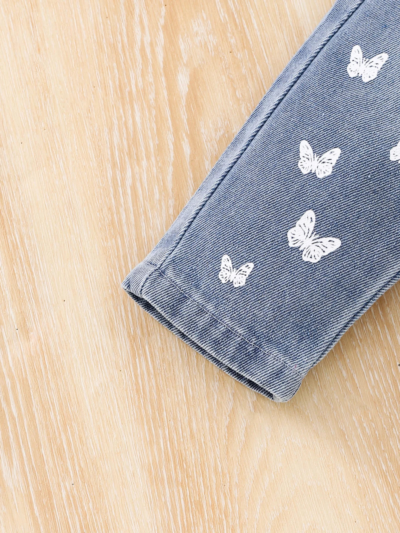 Baby Baby girl denim pants Spring and autumn printed butterfly waist all round elastic spray white denim light blue