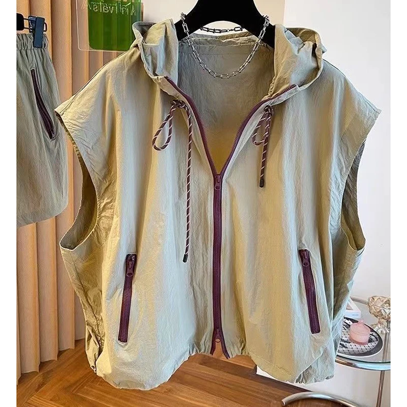 

Fashion Zipper Pockets Sleeveless Hooded Shirts Female Clothing 2025 Summer New Loose Solid Color All-match Tops Casual Blouses
