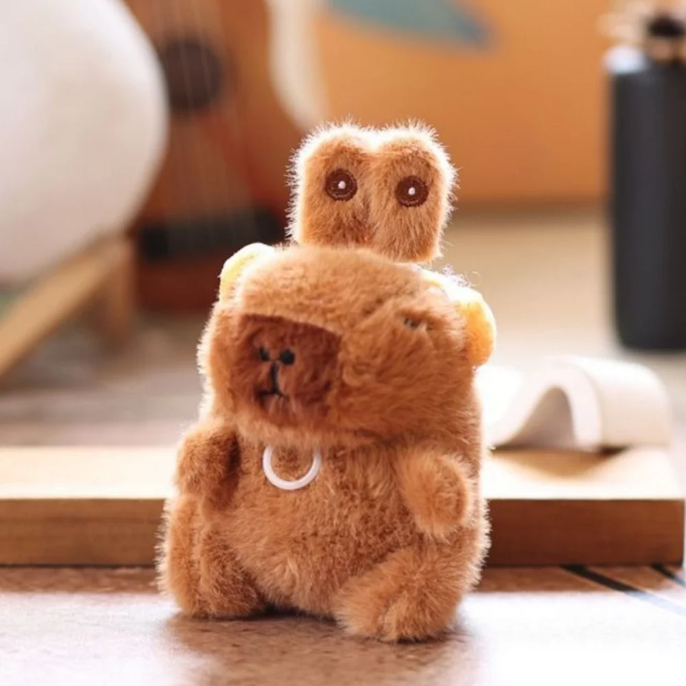 Capybara drôle en peluche pendentif oreilles de lapin mobiles marron Capybara en peluche porte-clés ailes douces Capybara peluche poupée sac suspendu