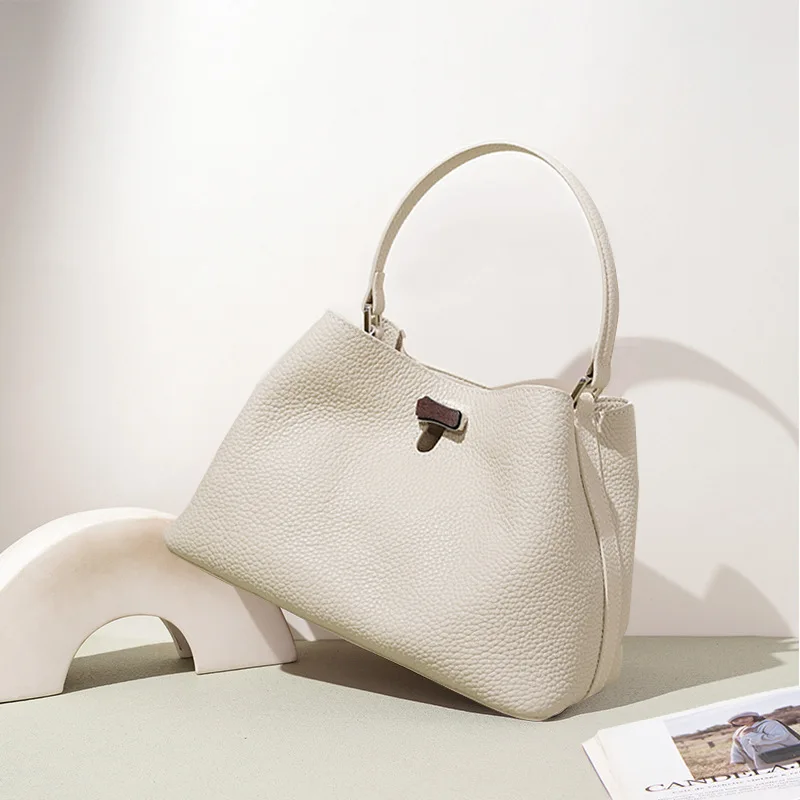 

First-layer Cowhide Women's Bucket Bag New Niche Design Genuine Leather Simple Lock Buckle Casual Fashion Handbag