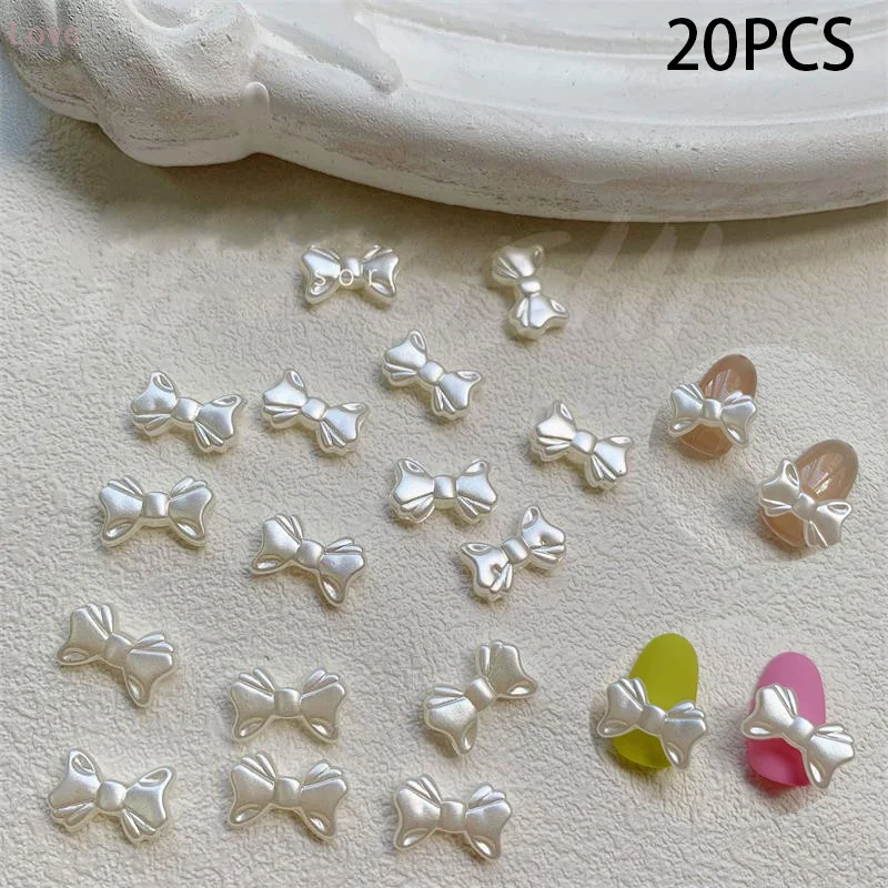 20 قطعة/الحقيبة اللؤلؤ الأبيض الرجعية الفرنسية بسيطة Bowknot مسمار الفن اكسسوارات أنيقة لطيف Bowknot ثلاثية الأبعاد الراتنج لتقوم بها بنفسك مسمار الفن اكسسوارات