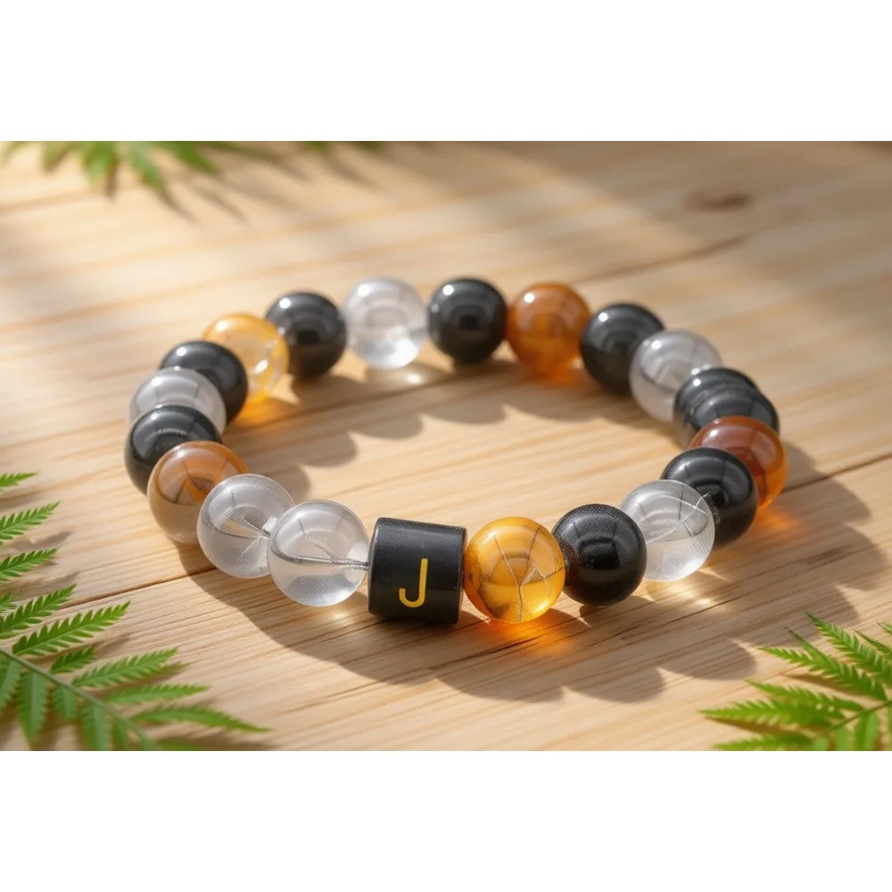 

Браслет из черного обсидиана, оникса и тигрового глаза с тройной защитой для мужчин