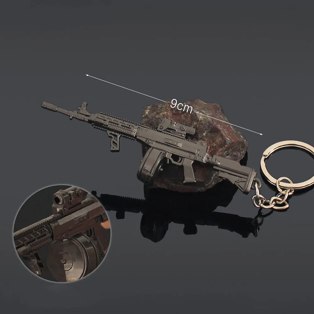 

Mini 9cm T03 Rifle Metal Toy Gun Model Keychain Pendant Game Weapon Collect Decorative Action Figure Kids Christmas Gifts ZG396