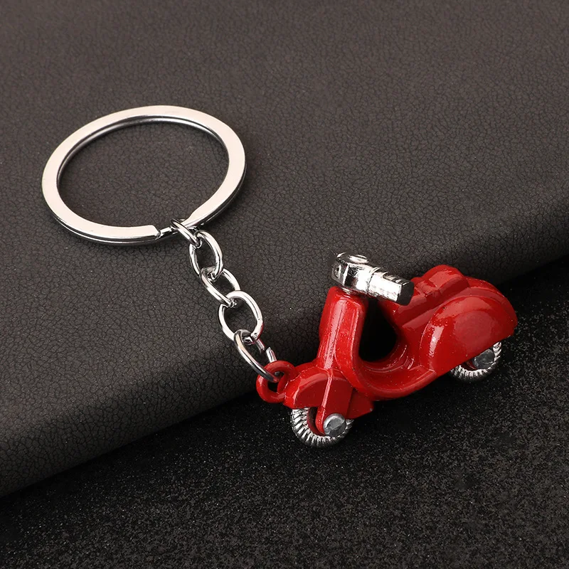 Punk keychain pendant pendant colorful Seiko products figure toy retro motorcycle direction wheels can be turned