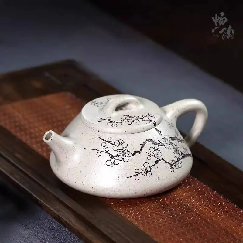 

Changtaoyixing Original Mineral Purple Clay Teapot, Tao Shunqing's Fully Handmade Seven-Star White Jade Plum Blossom Stone Pot,