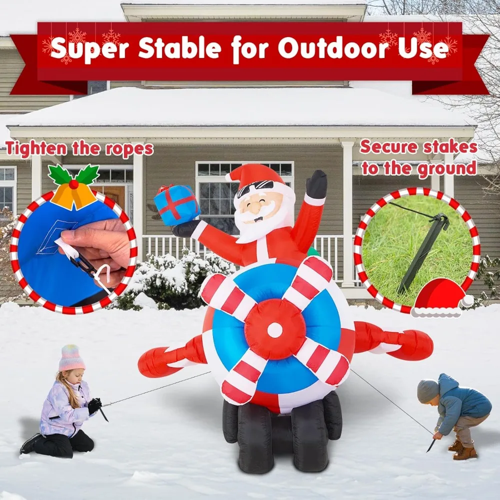 عيد الميلاد نفخ سانتا كلوز على طائرة هليكوبتر مع المروحة الدوارة في الهواء الطلق ديكورات للباحة