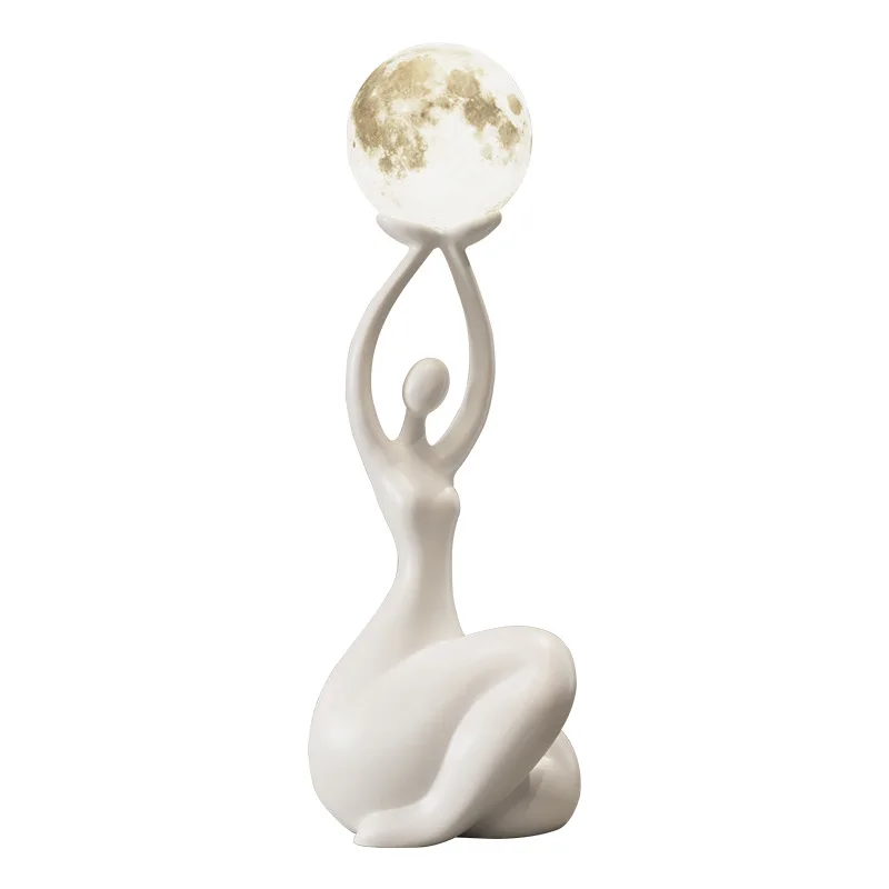 Abstract figure art ornaments with a sense of sophistication, modern living room TV cabinet with a floor-standing ambient lamp