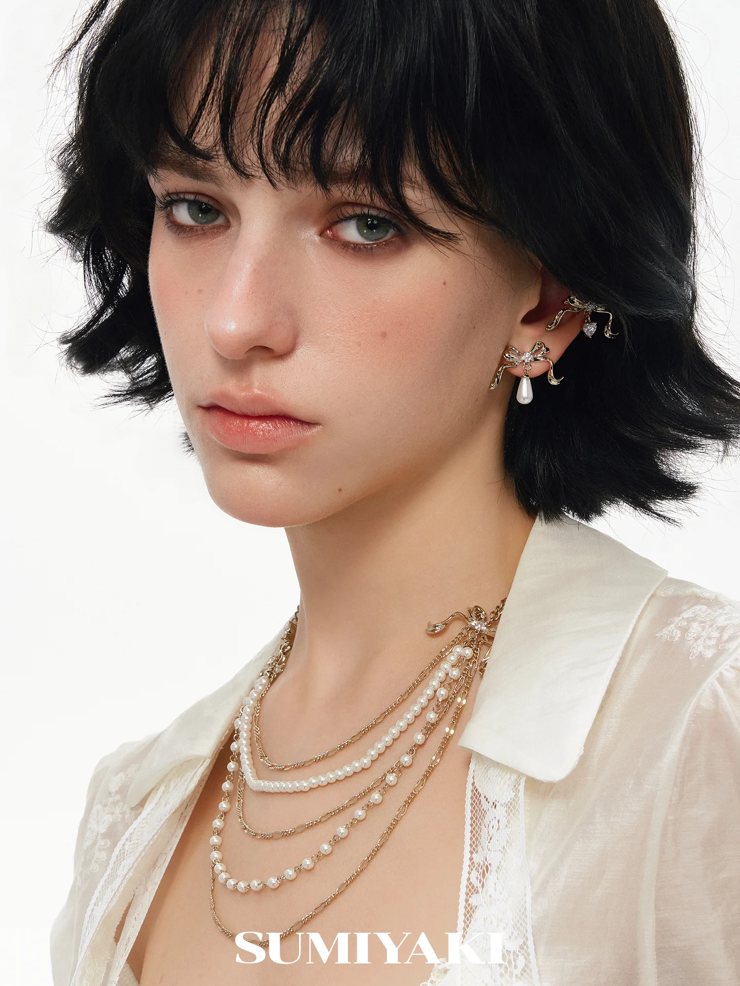 collana-con-fiocco-multistrato-serie-nastro-sumiyaki-orecchini-con-perle-barocche-e-catena-a-clavicola