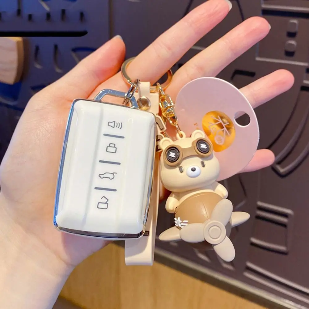 Cartoon Bear Doll Fighter Keychain Flying Glasses Bear Cute Schoolbag Pendant Stars Rotating Small Plane Car Key Ring Couple