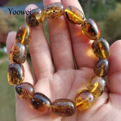 Yoowei 100% pulseira âmbar real para unissex, contas pretas genuínas, planta natural irregular, joias de cura médica, presente, atacado