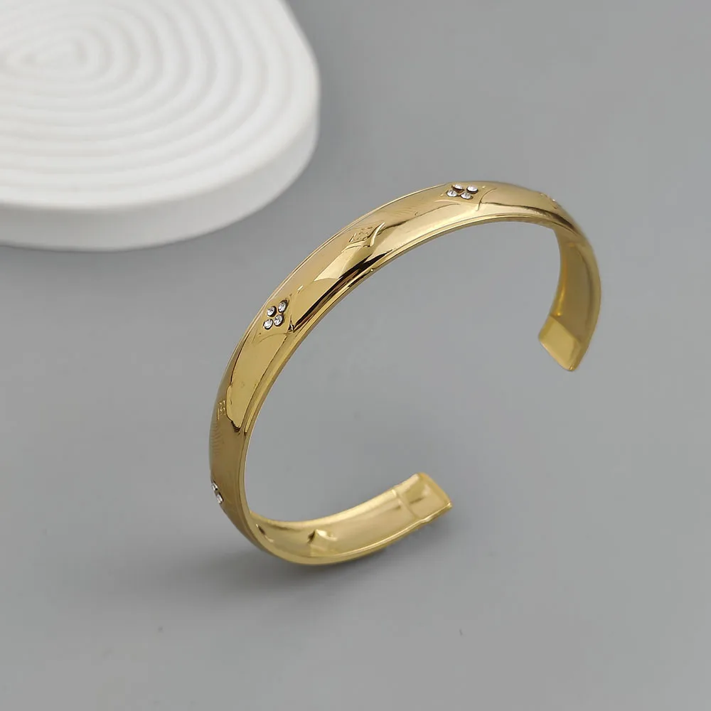 

Original design Four-leaf clover zircon gold-plated stainless steel women's bracelet, waterproof and rust-free, couple bracelet