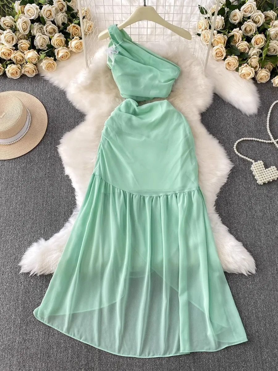 Foamlina エレガントシックな非対称ネックライトグリーンホリデードレス女性休暇カットアウトウエストホールプリーツ不規則なマキシドレス