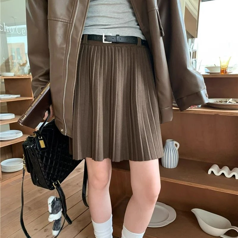 Rimocy Preppy สไตล์ถักกระโปรงมินิกระโปรงผู้หญิง 2025 ฤดูใบไม้ผลิเอวสูงจีบกระโปรงสั้นผู้หญิงกระโปรงสายกับเข็มขัด