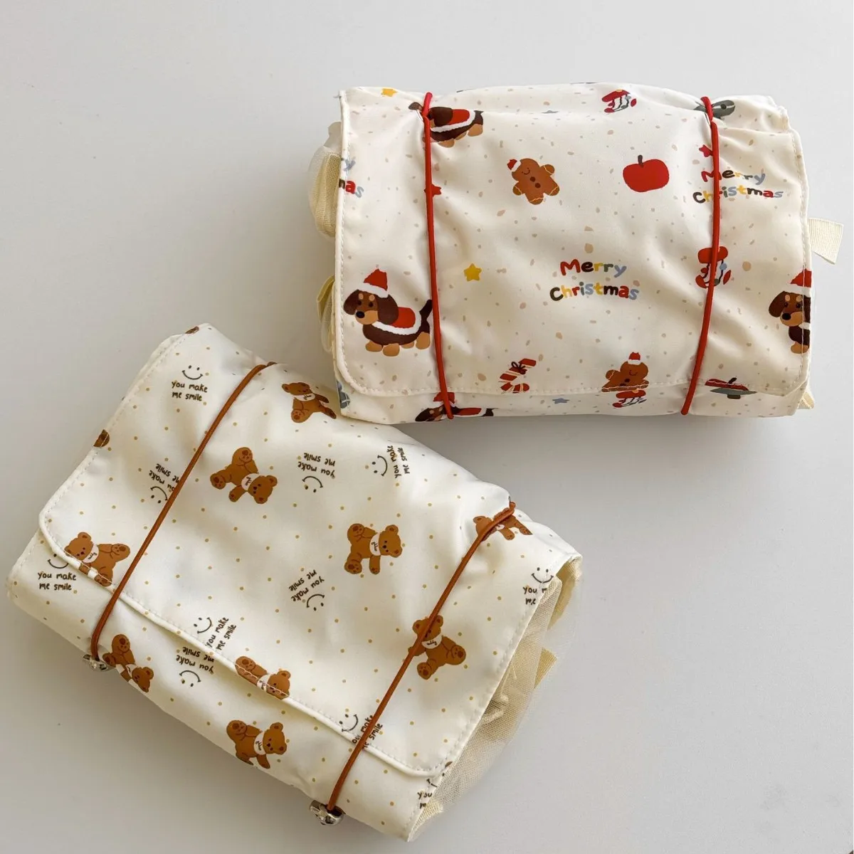 Nylon bib-shaped bear cartoon makeup bag with divided compartments, portable, large capacity foldable travel-sized toiletry bag