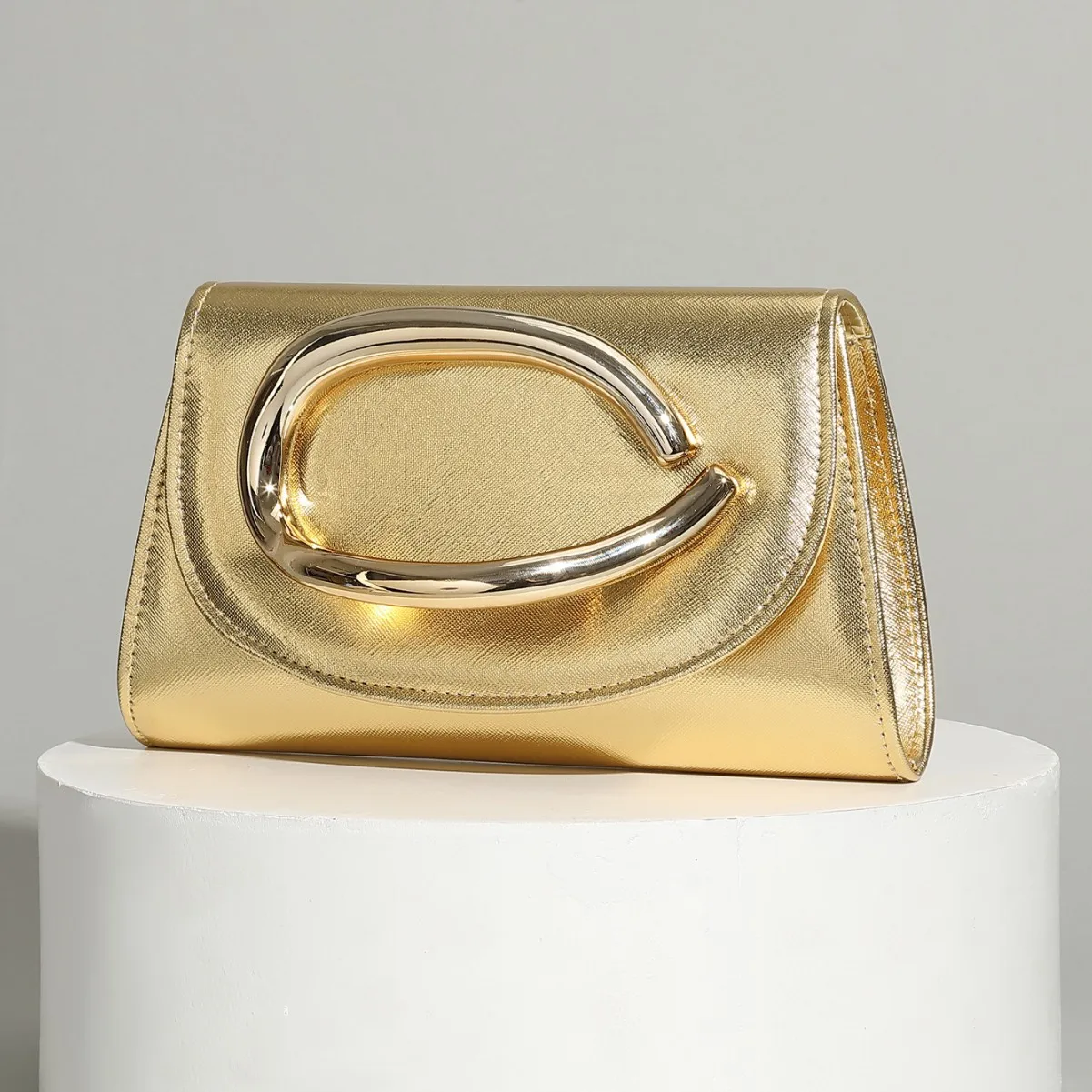

Textured hand-held PU dinner bag 2026 hand-held bag light luxury foreign senior women's bag