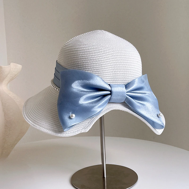 

Женская шляпа от солнца 2025 года, элегантная соломенная кепка-канотер с жемчужным бантом, модная складная летняя шляпа с защитой от УФ-лучей для пляжного отдыха
