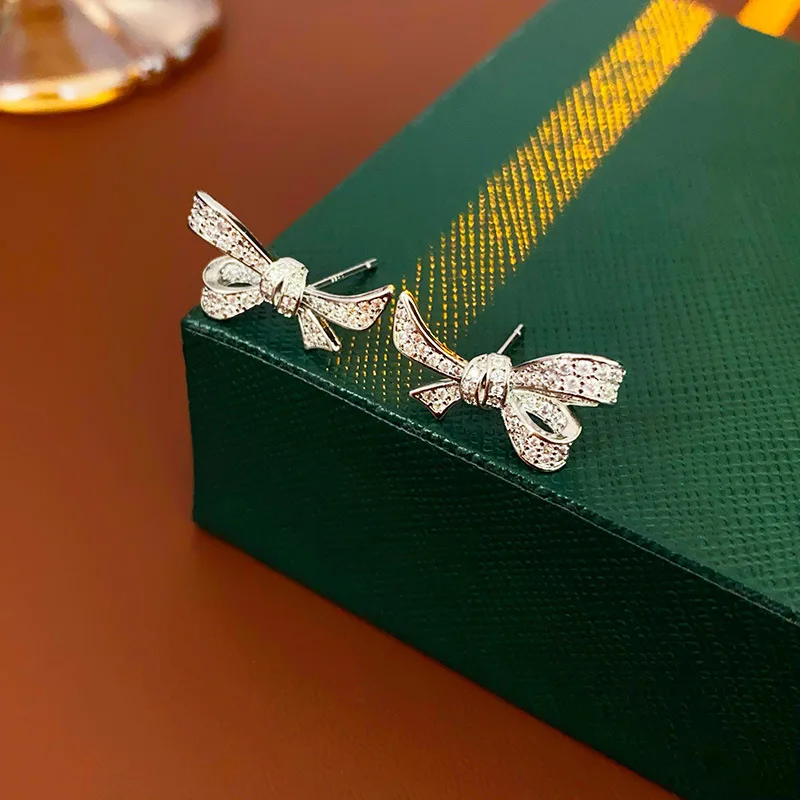 Silver Needle Light Luxury Zircon Bow Knot Small and Exquisite Elegant and High Grade Earrings for Women Jewelry.