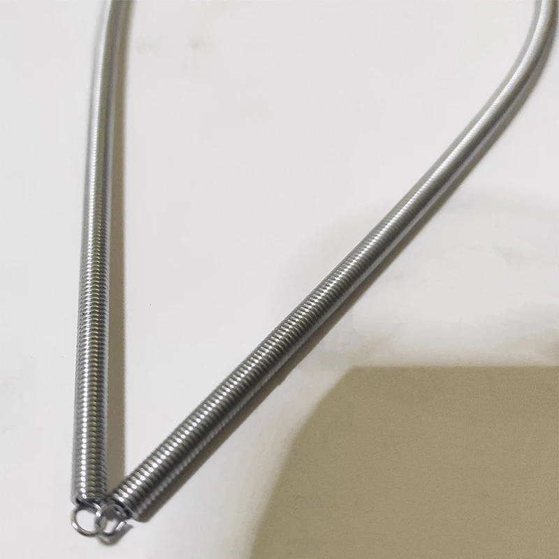 Parti della macchina per la produzione di sacchetti Guarnizione dell'olio della molla di tensione del gancio a punta con molla zincata per la macchina per film soffiato con alimentazione a taglio caldo freddo