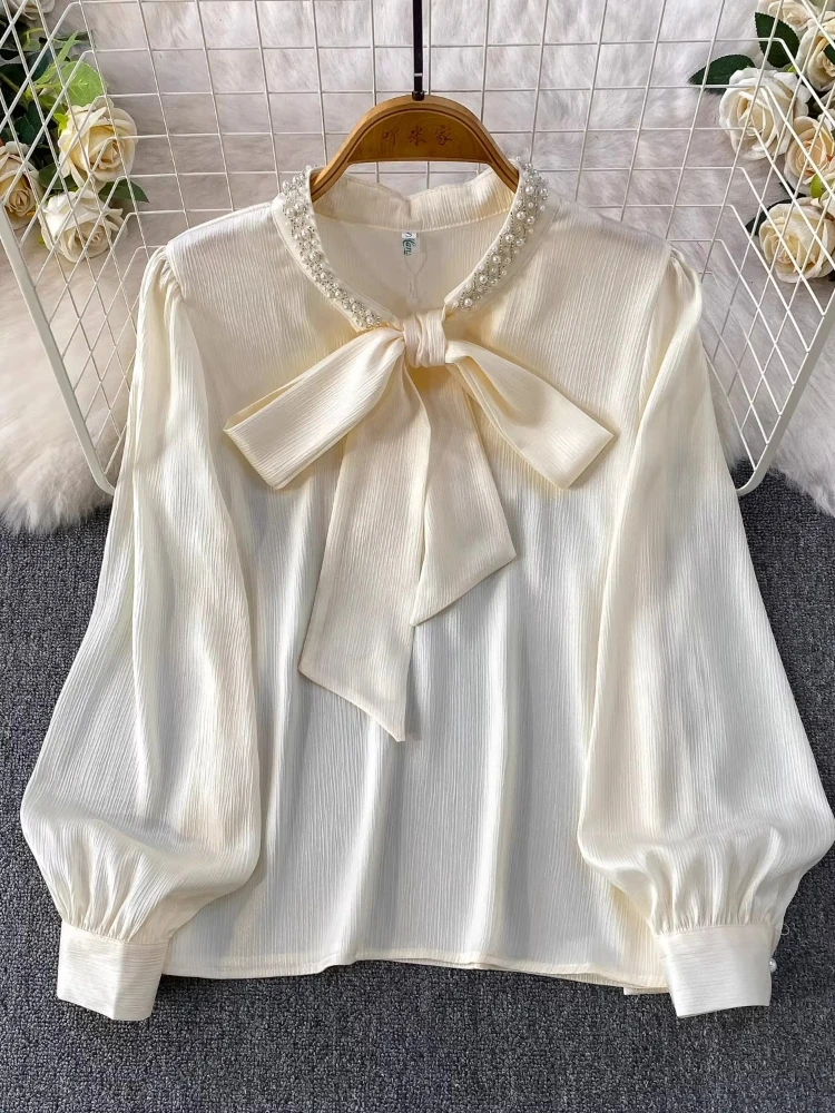 

Women's Shirt 2026 New Light Luxury Elegant Bow V-Neck Beaded Stitching Blouse Spring Autumn High Quality Puff Sleeve Base Top