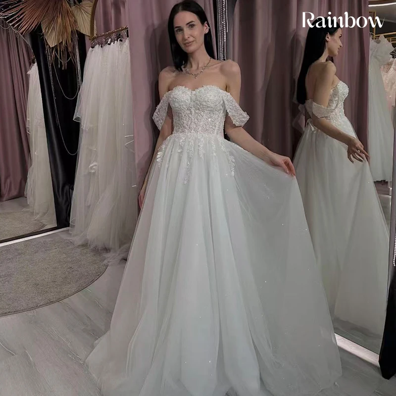 فستان زفاف مكشوف الكتفين من الأورجانزا مع تطريز على شكل حرف a بطول الأرض فستان زفاف مخصص برباط فيستدو دي نوفيا ترتر