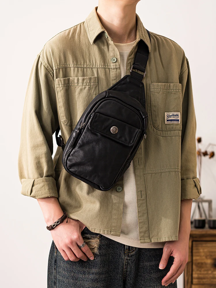 PNDME Outdoor daily light luxury genuine leather men's black chest bag weekend travel sports handmade cow leather crossbody bag