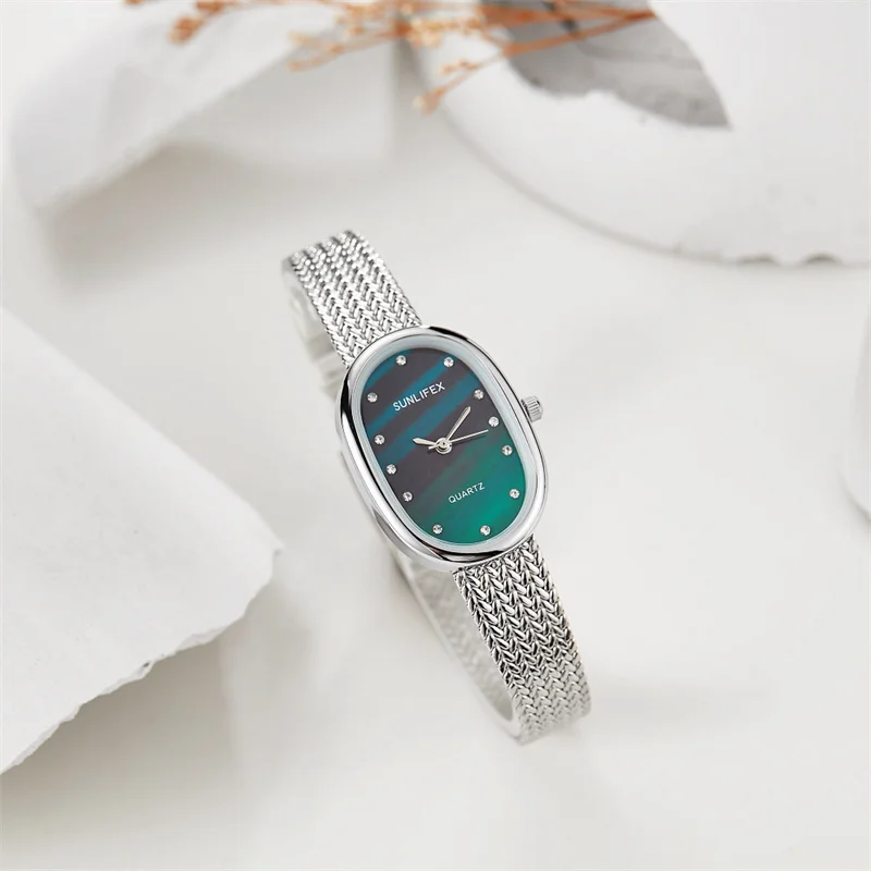 Fashion business alloy oval elegant waterproof women\'s quartz watch gradient color rhinestone dial suitable for daily life