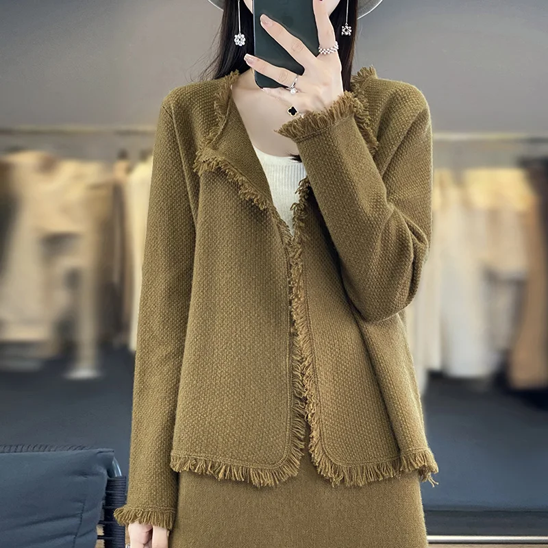 Autumn and winter new 100% wool sheep knitted coat one button cashmere cardigan female tassel solid color blouse loose and slim