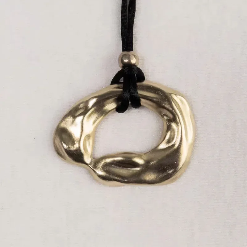 Japanese exaggerated bump pendant women's minimalist fashion leather rope long sweater chain autumn and winter light luxury