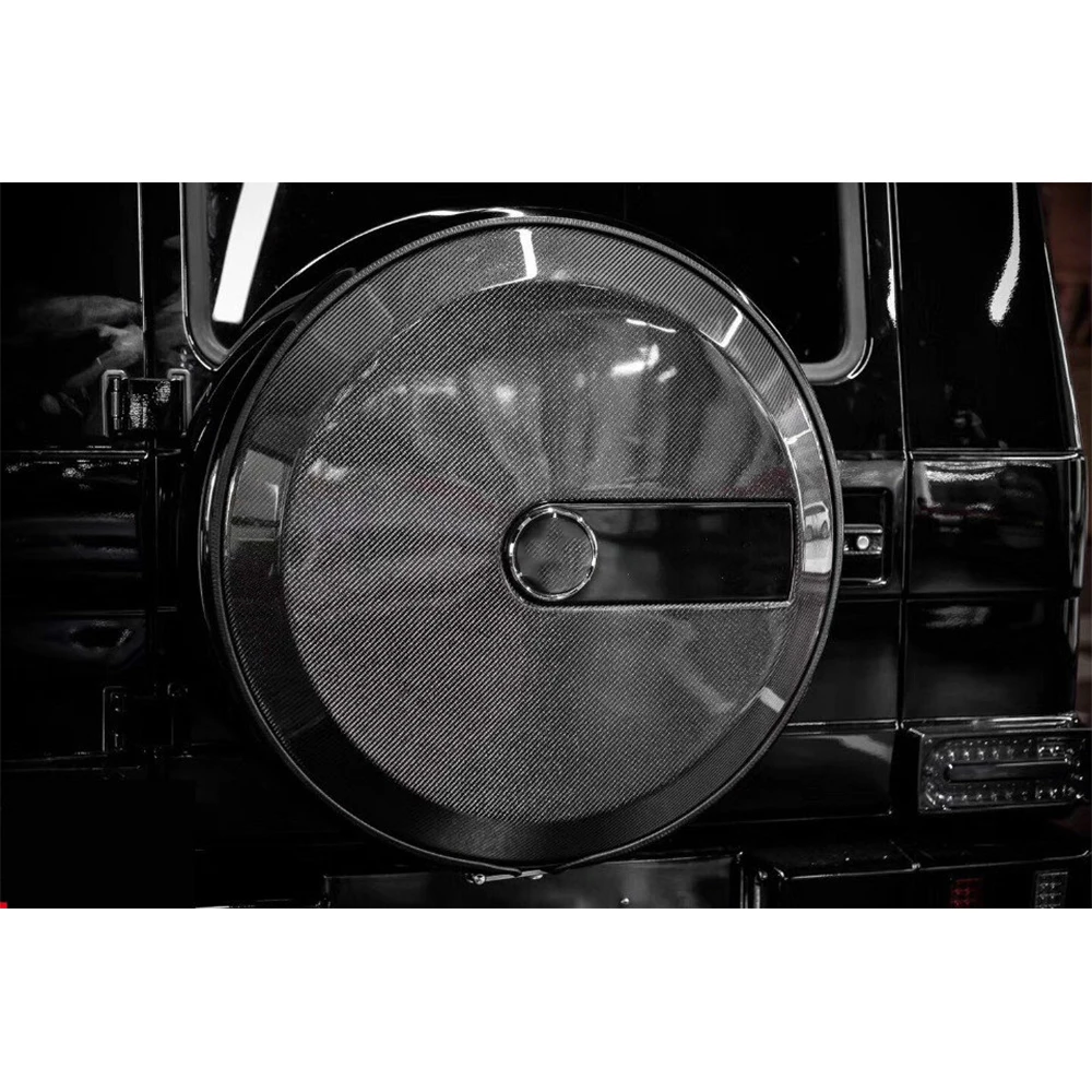 

2025 Новый G Class G450D G500 G63 W465 Крышка запасного колеса Сухой карбоновый задний дополнительный корпус шин Крышка автозапчастей Карбоновый черный