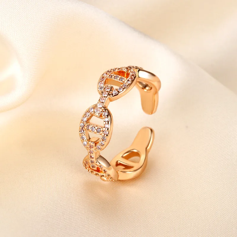 

Vermillion Gilt Double-Loop Knuckle Ring Architectural Nose Ring Full Pavé Crystal | Maximalist Sculptural Pinkie Stacker