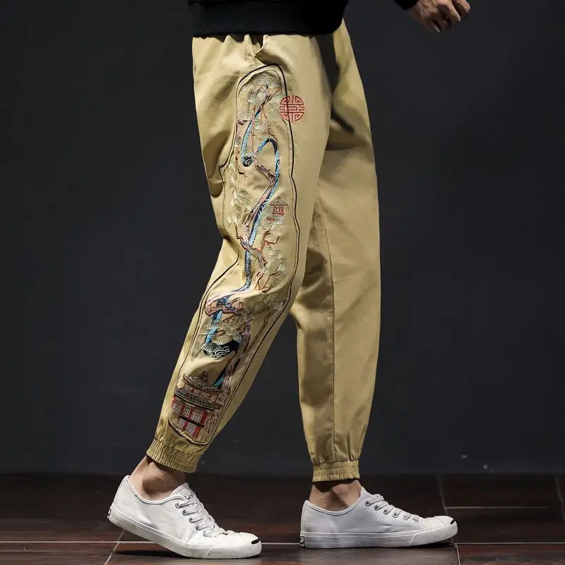 Pantalones casuales para hombre con estampado de cintura elástica, ropa bordada, bolsillos, pies atados, tendencia, combina con todo, joven, primavera, otoño, nueva moda