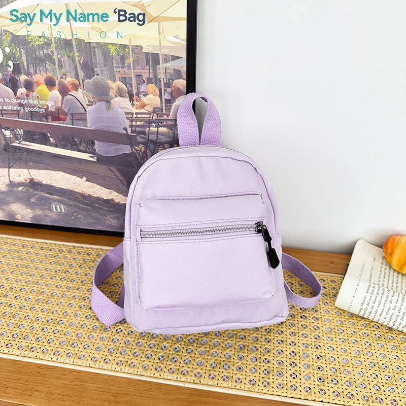 

2025 New Mini Womens Backpacks Trend Nylon Female Bag Small School Bags White Rucksack For Teen Girls Fashion Casual Backpack