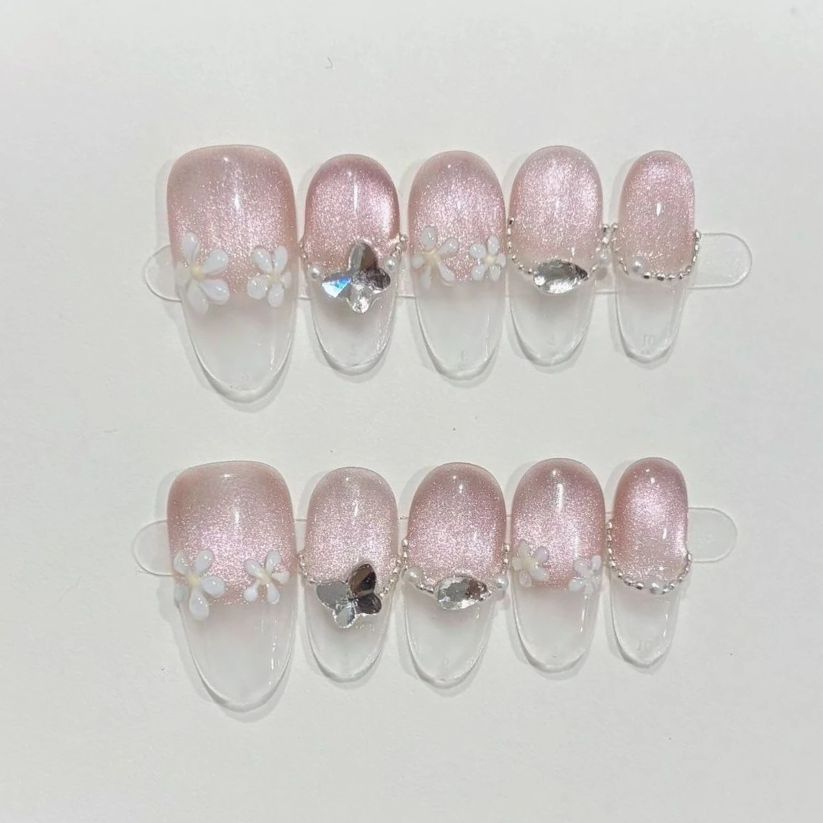 

10Pcs Spring Pink Cat Eye Press on Nails with 3D Flower Small Diamond Fashion Set Pearl Chain Nail Tips Detachable Oval Nail Art