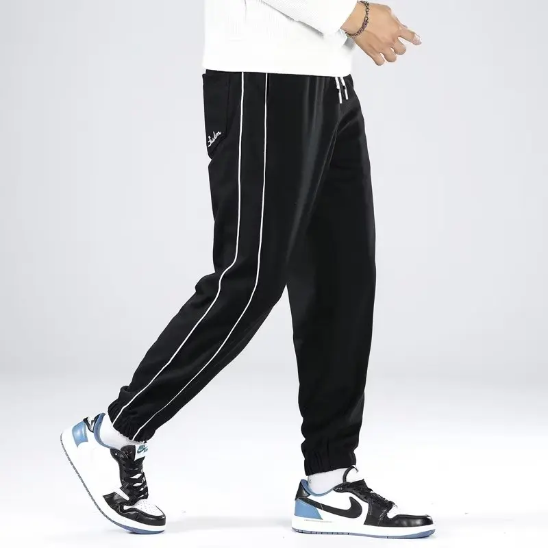 

Plus-size men's 2024 new spring and autumn new loose fashion letter design bundle feet sports three-color casual pants
