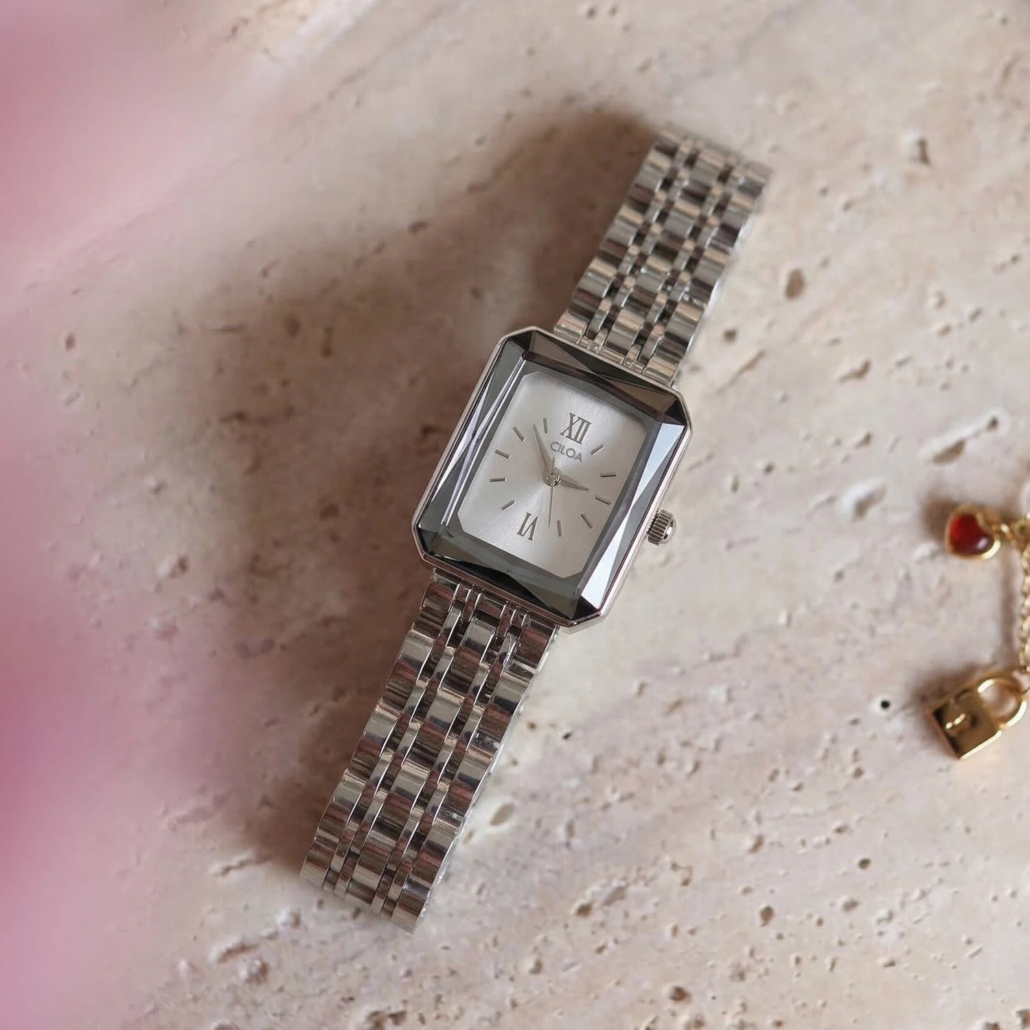 English: Luxury Diamond Cut Square Watch Roman Numeral Dial Stainless Steel Band Quartz Wristwatch Minimalist Elegant Business Ladies Watch