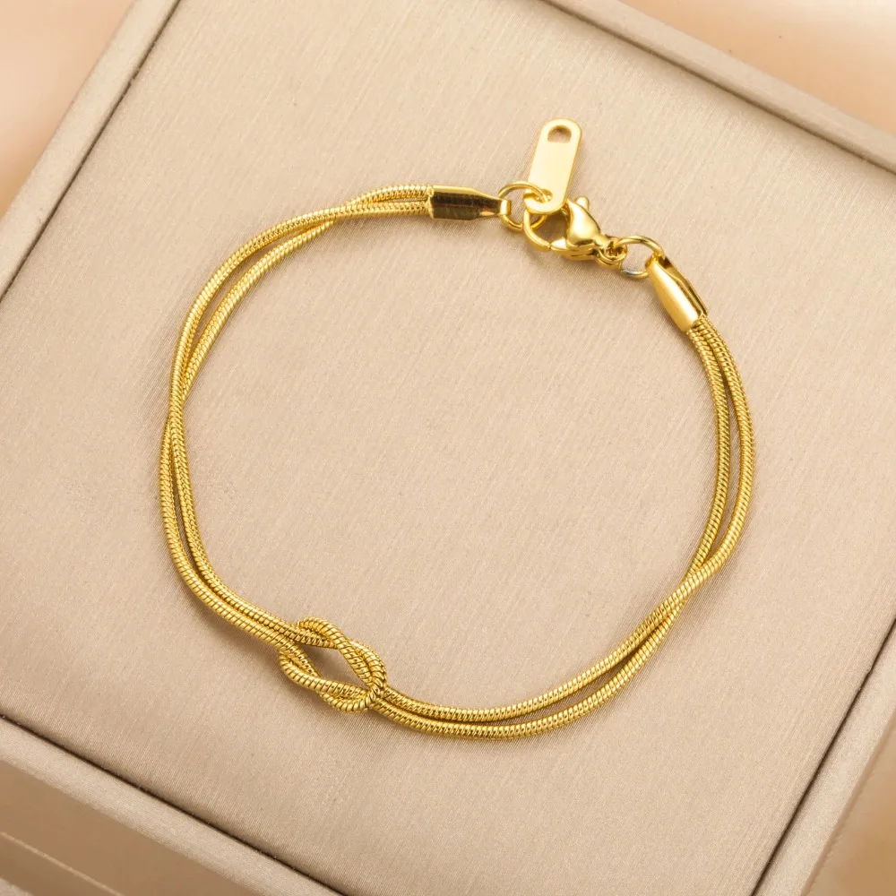 

Браслет Skyrim Double Snake Chain Love Knot из нержавеющей стали золотого цвета, регулируемый, для женщин и мужчин, парный, минималистичное украшение