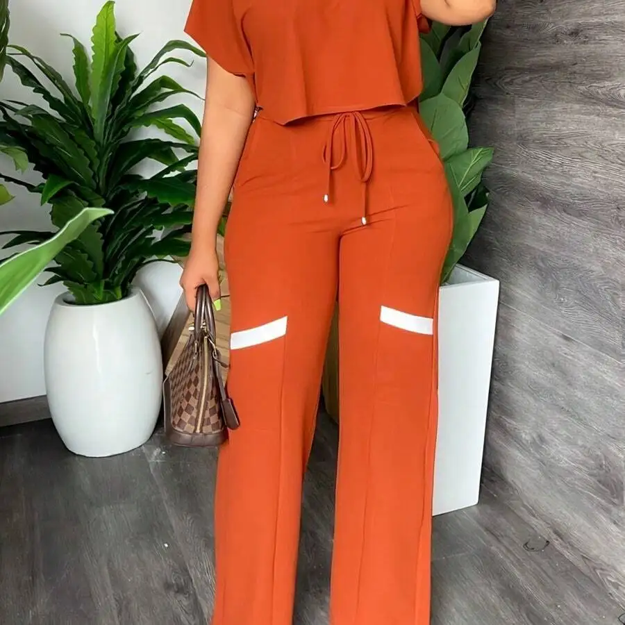

Women Solid Color Casual Short Sleeve Top And Straight Leg Pants Two Piece Set