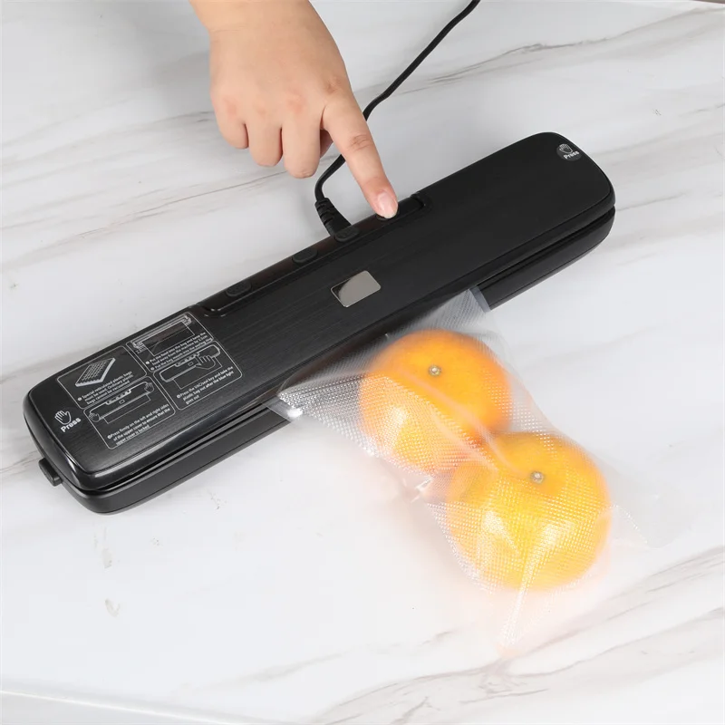 Food vacuum sealer with built-in cutter heat sealer for food preservation in dry and wet sealing mode