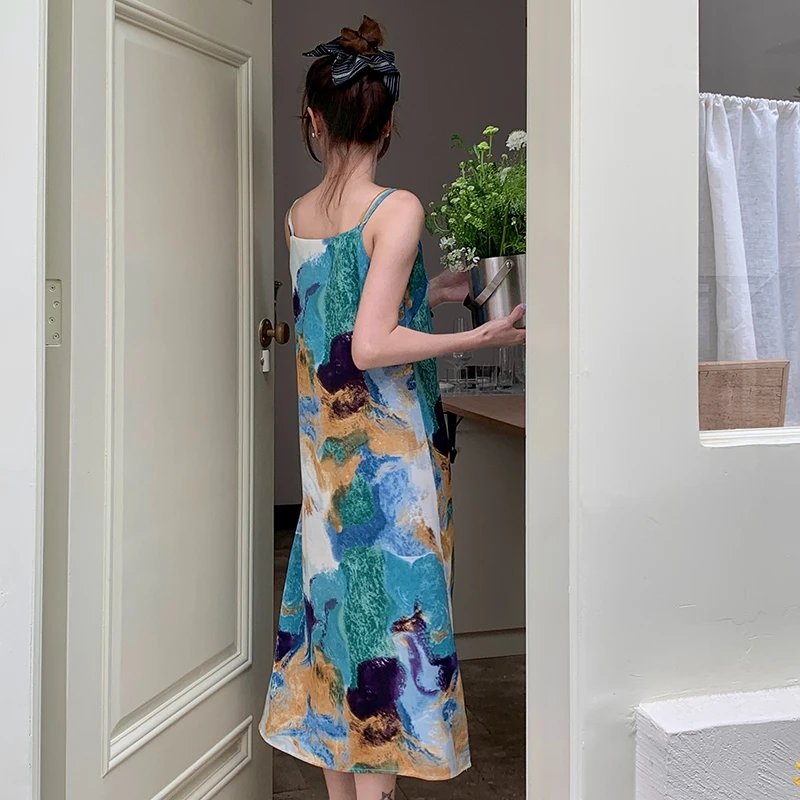 2025 zomer nieuwe blauwe inkt schilderij decoratieve dames gebreide bandjurk modieuze temperament losse en magere bloemenjurk