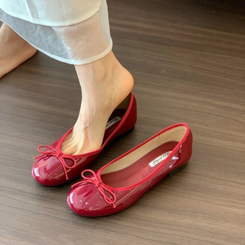

Women's fashion bow flat shoes spring and autumn new style French retro shallow opening single Ballet flats shoes